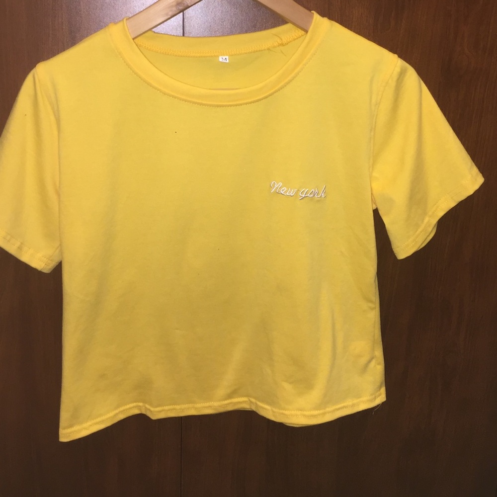 Yellow crop top with "New York" stitching